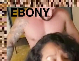 Ebony woman takes two cocks