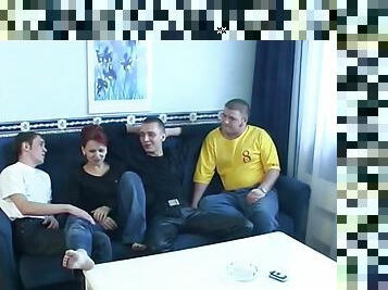 Redheaded MILF enjoys her time with three hung younger guys