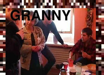 Horny granny gets fucked by multiple guys at the same time