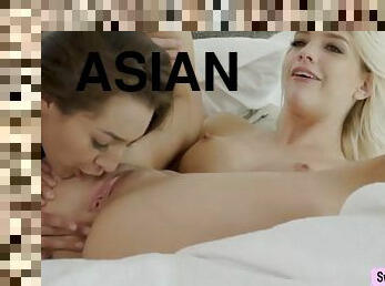 Asian teen and her hot classmate lick each others pussies