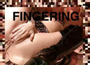 Rocker chick fingering away on herself