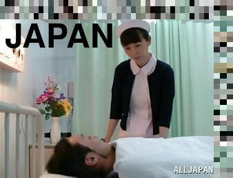 Japanese nurse fingers a patient's ass and lets him fuck her