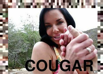 Cougar with big fake tits sucking a stranger's huge black cock