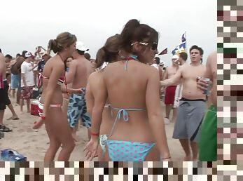 Amateur sluts in bikinis have fun on a beach in homemade clip