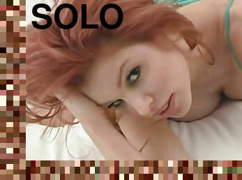 Seductive big tits redhead solo