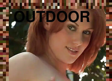 Milky white redhead naked outdoors