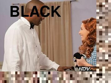 Smooth cunt of the small tits redhead takes an interracial fucking