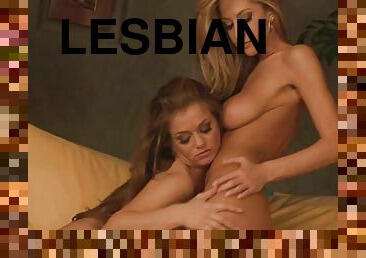 Two hot lesbians having fun on the couch