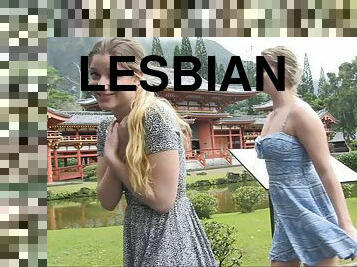 Lesbian couple kissing and flashing at a Japanese temple