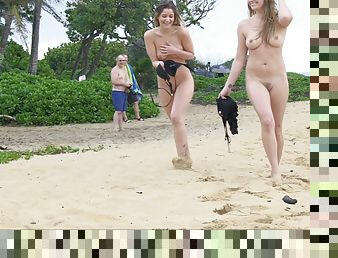 Bikini girls strip on the beach and show their tits to everyone