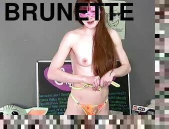 Sexy brunette in stockings masturbates on webcam