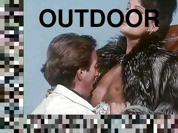Chick fucked outdoors in a fur coat