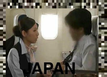 Japanese stewardess giving a handjob