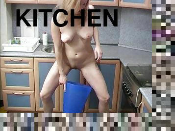 Roguish and shameless whore is pissing in the kitchen