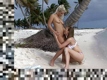 Sensual oral by the beach for two alluring lezzies