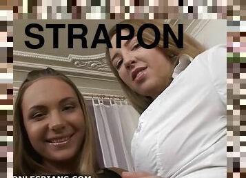 That strapon is so big it destroys that lesbian pussy
