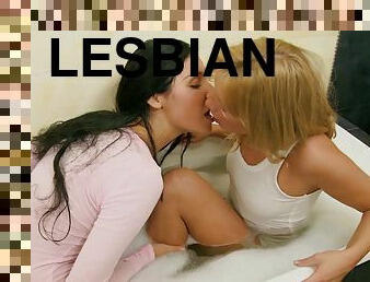 Flirtatious lesbian girls having steamy sex in the shower