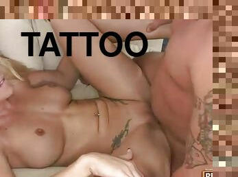 Naughty blonde pornstar with tattoos fucking two average joes