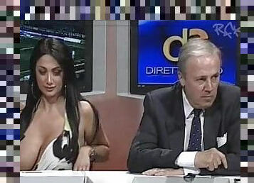 Huge tits girl on Italian news program