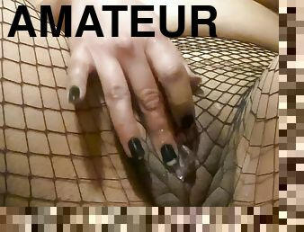 Horny latina ends up with creamy pussy while masturbating with fishnets