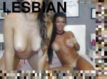 HOT TANNED LESBIANS EAT EACHOTHER OUT WILD
