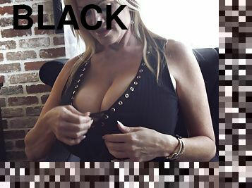 Kelly Madison takes off her black dress for a solo session