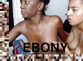Ebony lesbian couple kissing