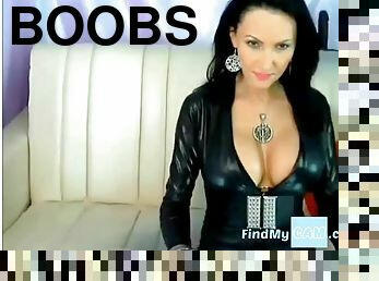 Pretty babe in leather strips to show her big boobs and dildo her tight pussy.