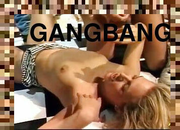Whore in an 80s gangbang video