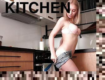 Horny blondie Patricia Tease drops her clothes in the kitchen