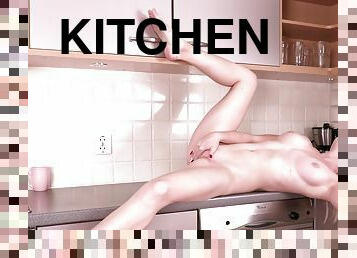 Video of nice tits blondie Afelia masturbating in the kitchen