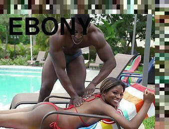 Charming ebony hottie Evi Rei enjoys having outdoors sex by the pool