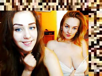Two sexy girls use vibrator on webcam