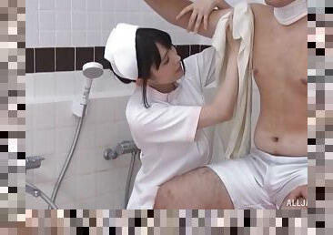 Sexy Japanese nurse takes off her clothes to ride a patient