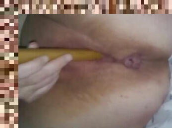 My horny wife squirts using a wooden toy