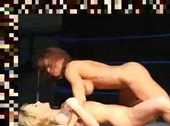 Two muscular women wrestle and shower
