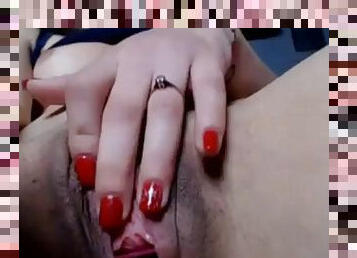 Hot girl enjoys fingering herself live on the webcam