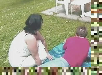 Chubby Brunette Mom Outdoors by young Guy