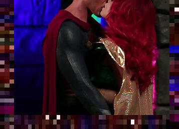 Redhead heroine is about to suck Superman's fully-erected penis