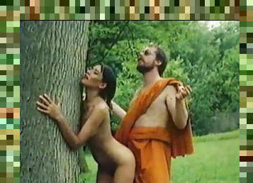 Monk fucks a worshipful girl outdoors