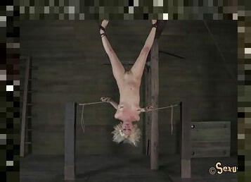 Blonde called Cherry tortured while hanging upside down in the dungeon