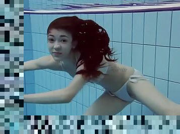 Flawless european teen roxolana takes her bikini off underwater