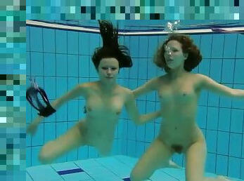 Both ladies in bikinis are hot stuff underwater