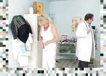 Mature blonde gets her flabby cunt toyed by a gynecologist