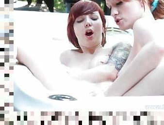 Lesbians in the hot tub have naughty sex