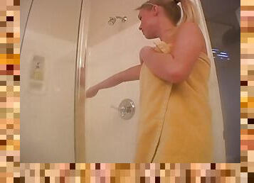 Watch this video to see this busty blonde masturbating in the shower