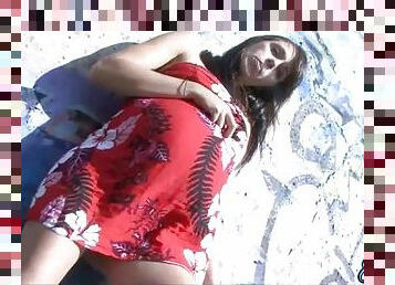 Pregnant babe Embrianna having a smoke on the beach