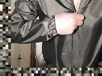 Shiny nylon man in black nylon jacket