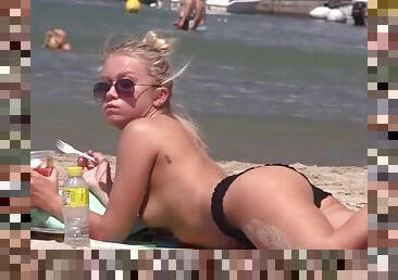 Hot ass blonde girl in black bikini bottoms