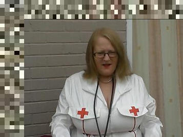Mature in PVC nurse outfit